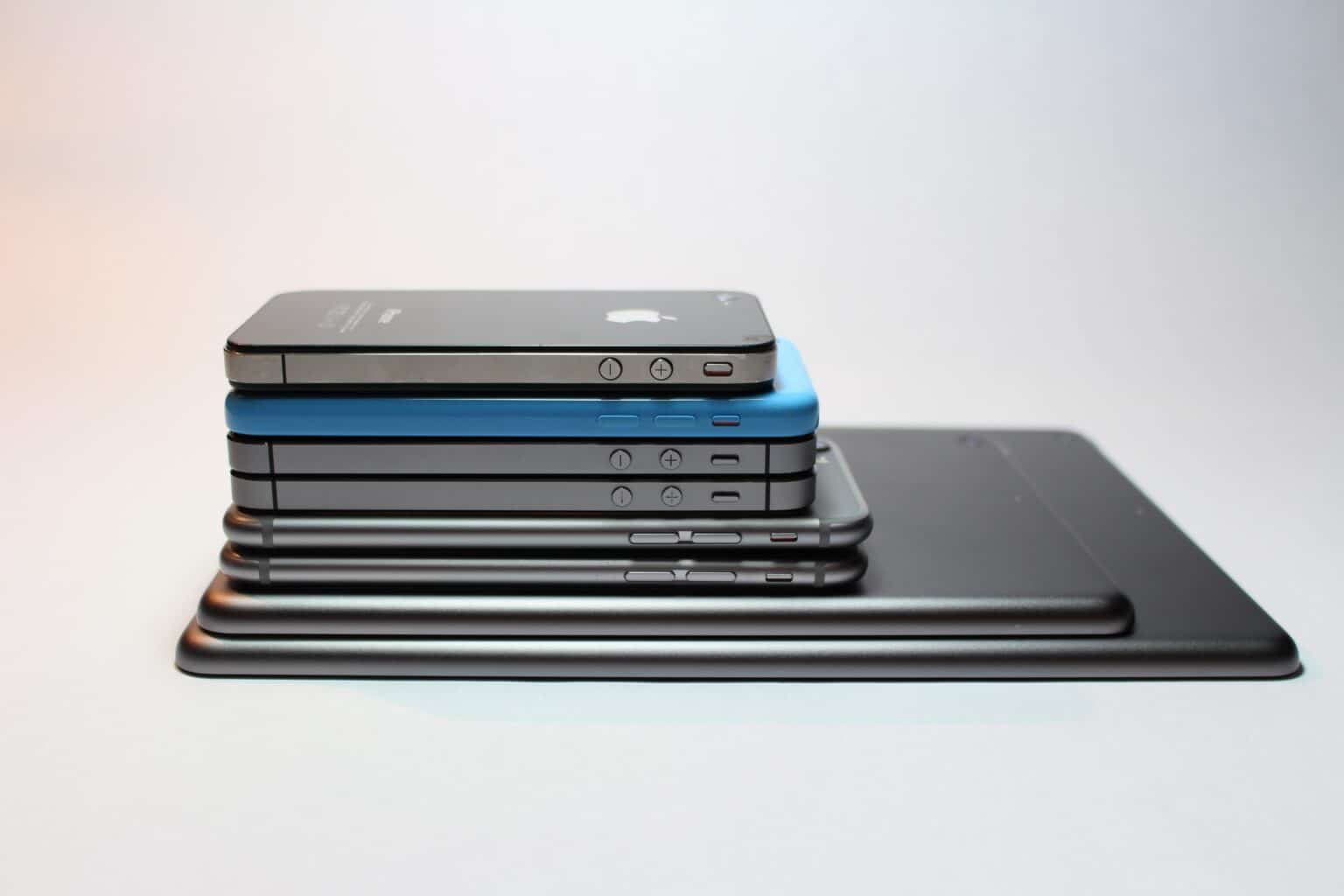 A stack of innovative iPhones stacked on top of each other, showcasing cutting-edge technology in the field of consulting.