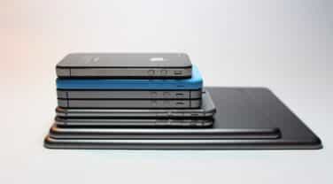 A stack of innovative iPhones stacked on top of each other, showcasing cutting-edge technology in the field of consulting.