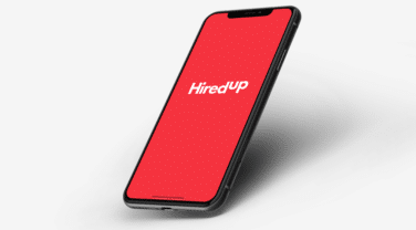 A strategic red phone with the word hirep on it, symbolizing company innovation.