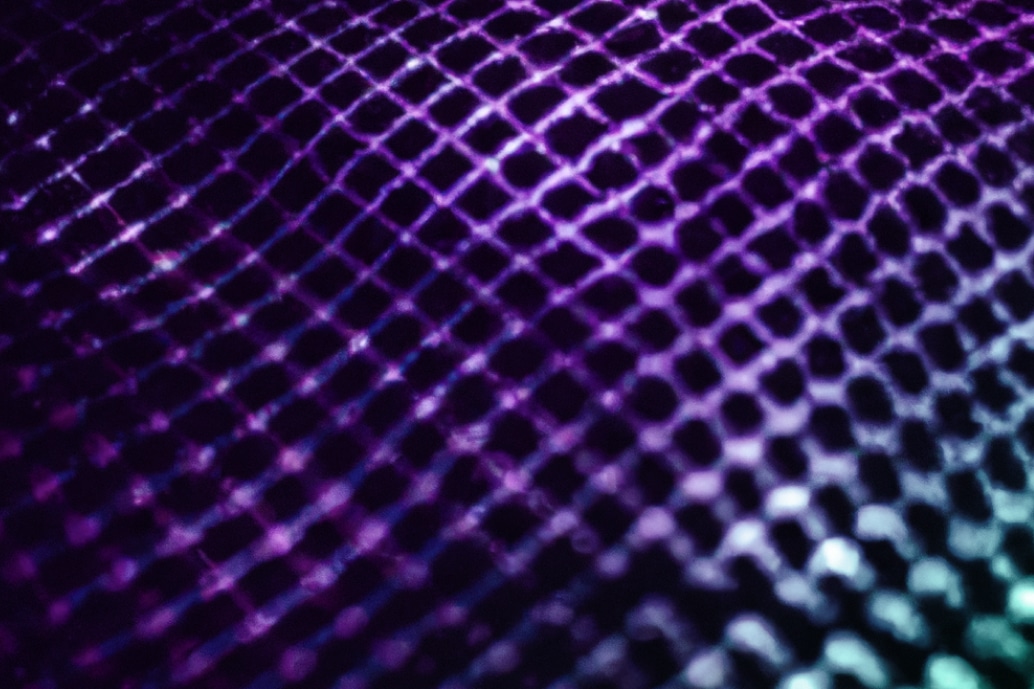 An innovative image of a mesh background in shades of purple and blue, perfect for tech and consulting projects.