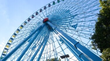 The blue ferris wheel showcases the company's innovation in tech.