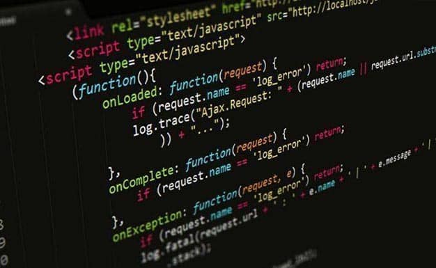 A strategic close up of a computer screen with code on it.
