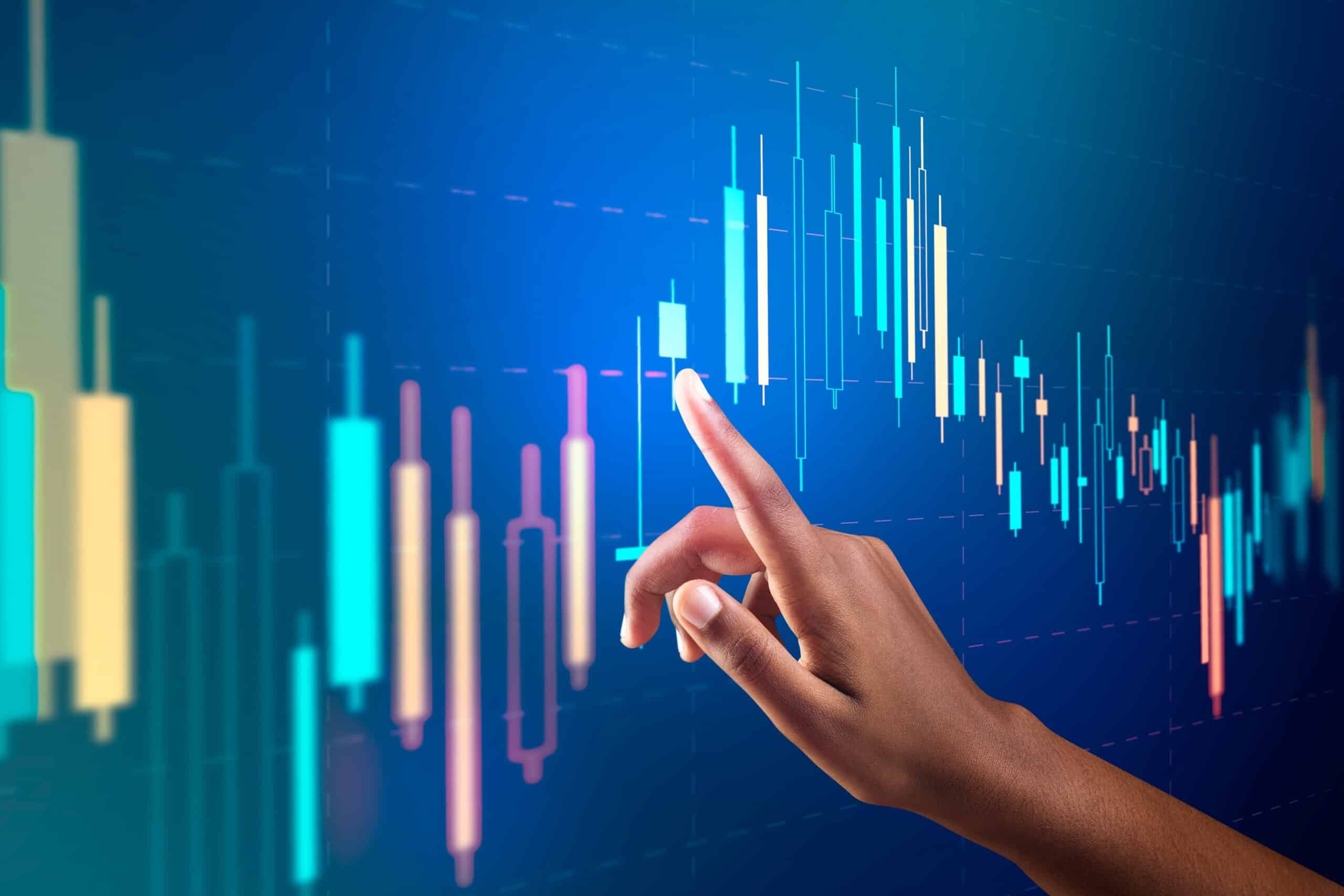A hand from a global company is pointing at an innovative stock chart on a blue background.
