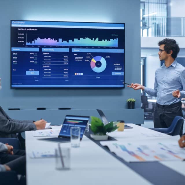 A global company strategizing in a conference room.