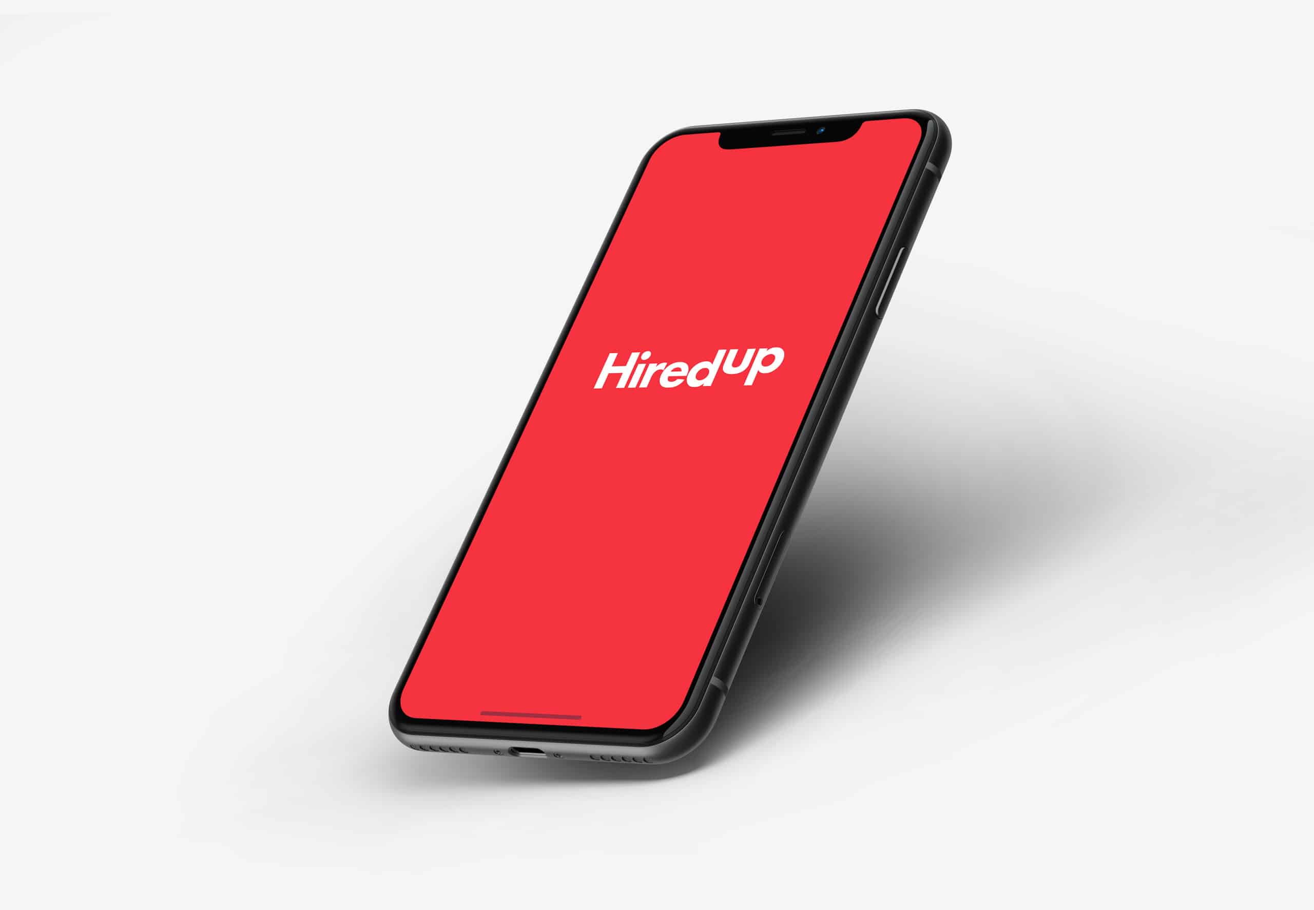 A red home phone with the word hirep on it.